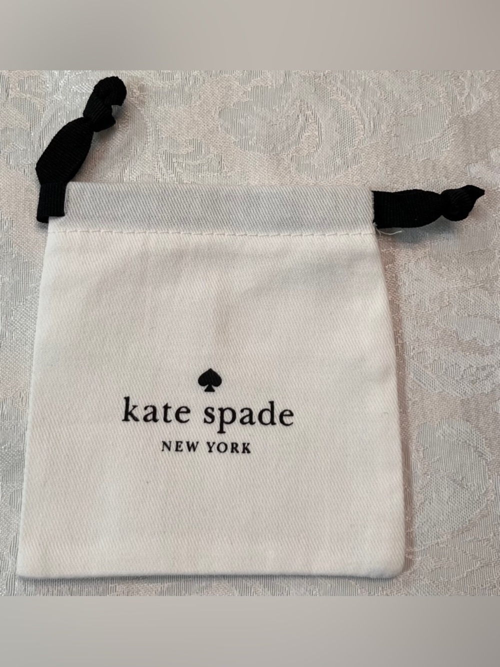 Kate Spade Jewelry Pouch in White Cotton with Black Drawstring NWOT